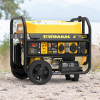 A FIRMAN Power Equipment Gas Portable Generator 4550/3650W with remote start, 120/240V, and CO Alert features stands on gravel outdoors near water and trees.