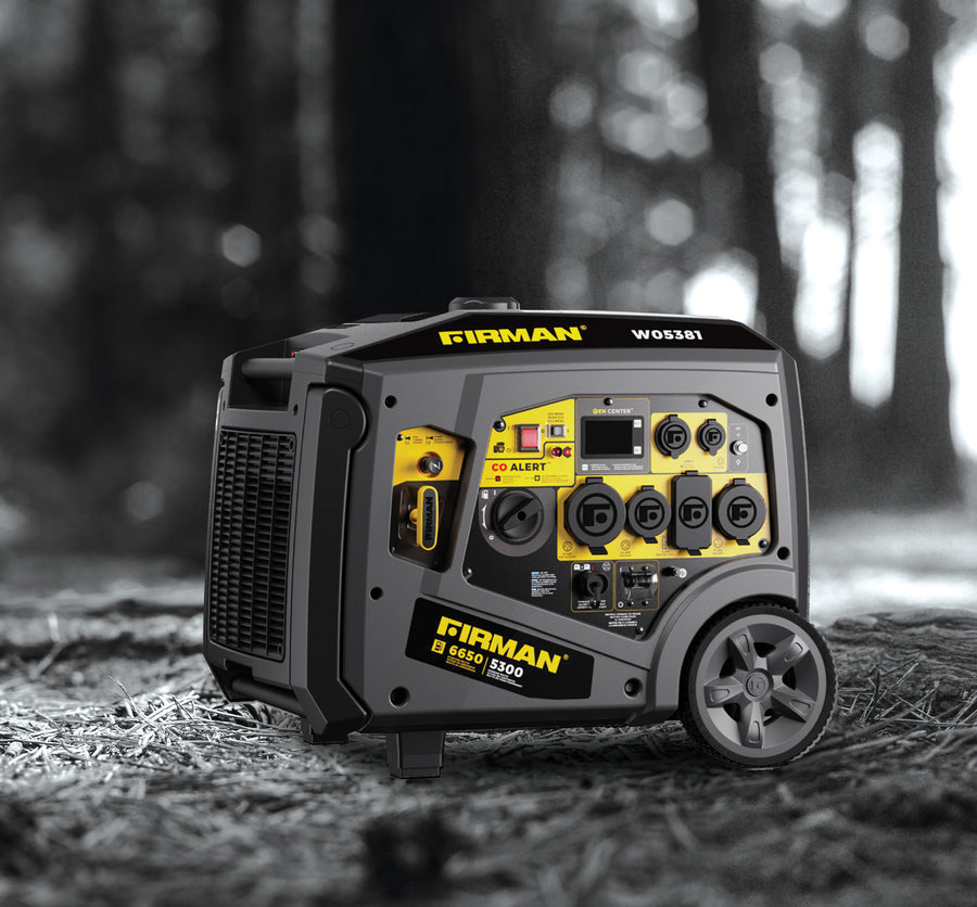 Portable FIRMAN Power Equipment Gas Inverter Portable Generator 6650/5300 Watt 120/240V CO Alert positioned on forest floor, showcasing various outlets and control panel with yellow and black design.