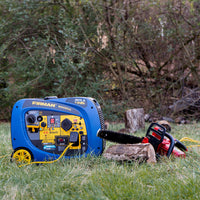 A FIRMAN Power Equipment Dual Fuel Inverter Portable Generator 4125W with Electric Start and CO ALERT, along with a chainsaw, rests on the grass outdoors with trees in the background.