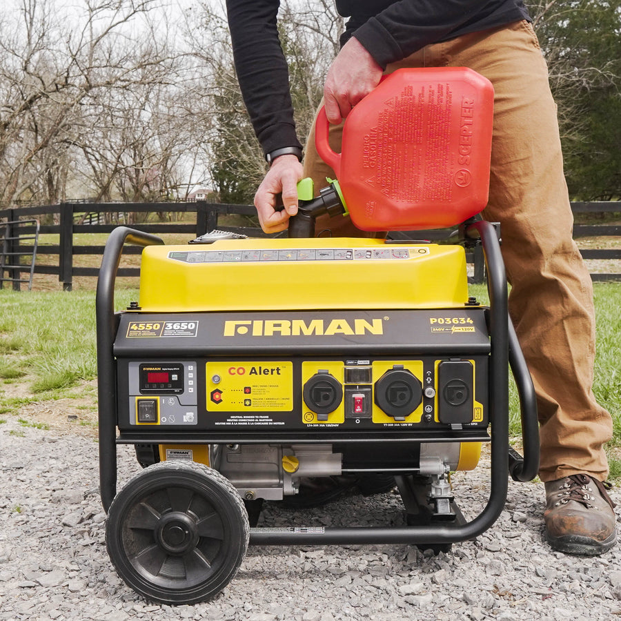 A person refueling a portable yellow FIRMAN Power Equipment Gas Portable Generator 4550W Recoil Start 120/240V with CO ALERT outdoors.