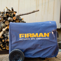 A FIRMAN Power Equipment Large Size Portable Generator Cover, in blue, protects a portable generator placed on the ground next to firewood and against a beige wall.