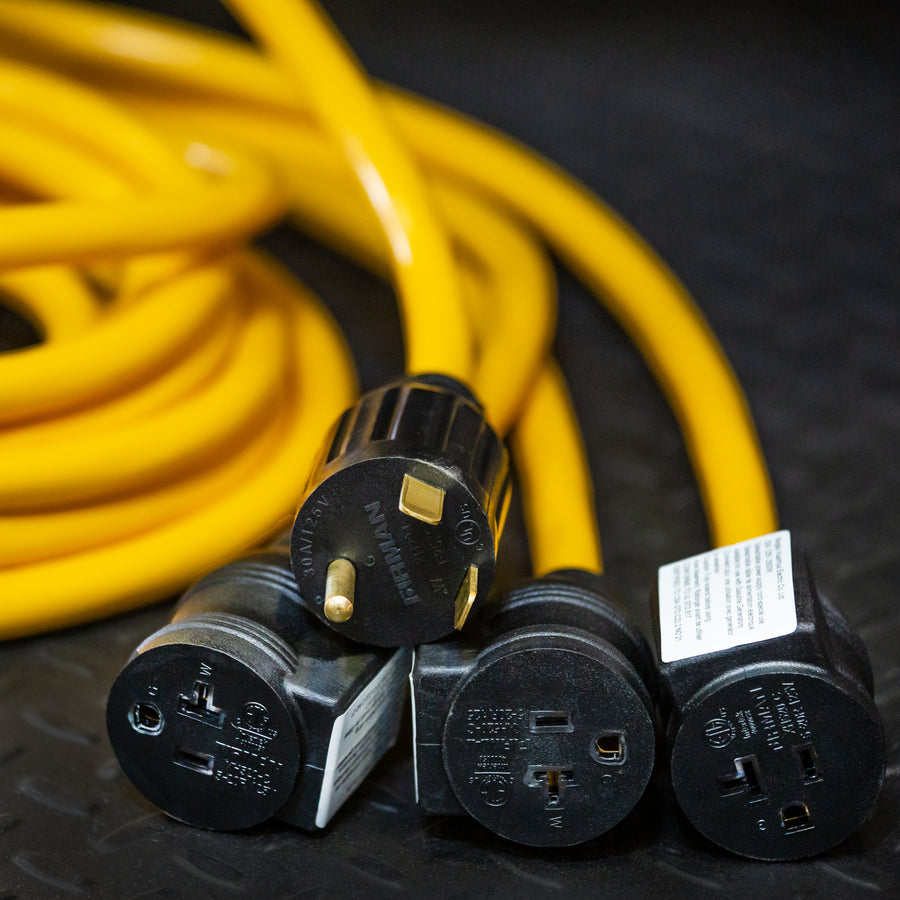 Three yellow FIRMAN Power Equipment 25' Heavy Duty TT-30P to (3)5-20R generator power cords with black plugs and prongs, plus storage straps, are displayed on a textured black surface.