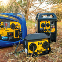 Three RV ready inverter generators with yellow control panels are connected outdoors using FIRMAN Power Equipment’s 50A PORTABLE GENERATOR PARALLEL KIT, positioned near trees and dry grass.