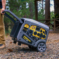 A person is pulling a FIRMAN Power Equipment Gas Inverter Portable Generator 6850/5500 Watt Remote Start 120/240V CO Alert on a rough gravel surface near a wooden cabin surrounded by trees, ready to engage the eco mode for quieter operation.