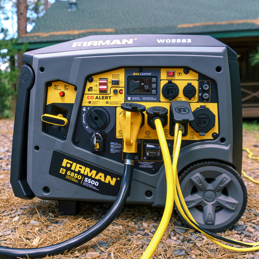 A FIRMAN Power Equipment Gas Inverter Portable Generator 6850/5500 Watt with Remote Start and 120/240V CO Alert sits on the ground outdoors, with a house visible in the background. Multiple cables are connected to this portable power solution, which also features an eco mode for optimal efficiency.