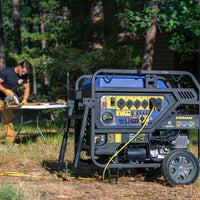 The FIRMAN Power Equipment TRI FUEL PORTABLE GENERATOR 15000W ELECTRIC START 120/240V WITH CO ALERT, equipped with a V-Twin engine, is set up outdoors, supplying 15000 watts of power to a workstation where a person is cutting wood with a saw.