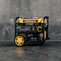 A yellow and black FIRMAN Power Equipment gas portable generator 5000W with remote start, displayed in front of a grey concrete wall.