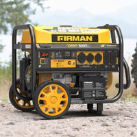 A FIRMAN Power Equipment GAS PORTABLE GENERATOR 11600W with remote start, 120/240V, wheels, control panel, and CO alert stands on gravel—ideal for dependable outdoor backup power.