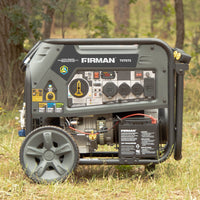The FIRMAN Power Equipment Tri Fuel Portable Generator 9400W Electric Start 120/240V with CO Alert sits on grass outdoors, offering reliable power anywhere with multiple outlets and large wheels for easy portability.