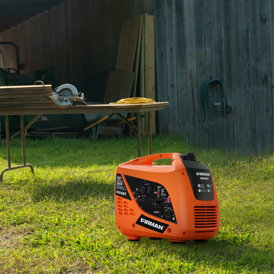 A FIRMAN Power Equipment Gas Inverter Portable Generator 2000/1600W with recoil start sits on grass near a shed, with tools and wood visible on a table in the background.