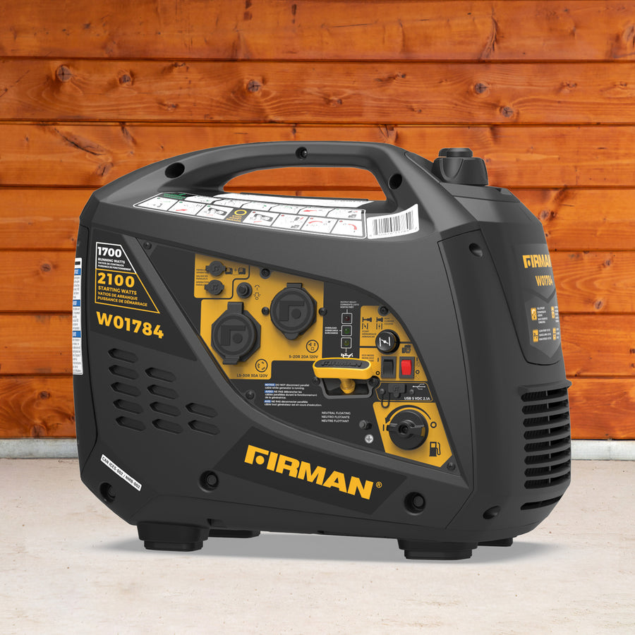 A FIRMAN Power Equipment Inverter Portable Generator 2100W Recoil Start, in black and yellow, sits on a concrete floor in front of a wooden wall.