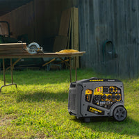 A quiet FIRMAN Power Equipment Gas Inverter Portable Generator 7850/6300 Watt Remote Start sits on grass near a table with a circular saw, extension cord, and stacked wood by a wooden fence and shed.