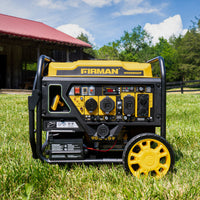 A FIRMAN Power Equipment Dual Fuel Open Frame Inverter 4500W Electric Start with CO Alert generator is on grass by a wooden building. The portable unit is yellow and black, and features wheels for easy movement.