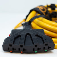 A black FIRMAN Power Equipment power strip with multiple outlets for optimal workspace organization, surrounded by a coiled yellow 25' Heavy Duty L14-30P to (4) 5-20R Power Cord With Storage Strap.