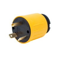Yellow FIRMAN Power Equipment TT-30P to L5-30R Adapter with metal pins and labeling, isolated on a light background.