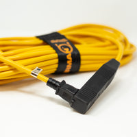 A coiled yellow 50' Medium Duty 5-15P to (3) 5-15R Generator Utility Power Cord With Storage Strap by FIRMAN Power Equipment, with a connector visible in the foreground, against a white background.