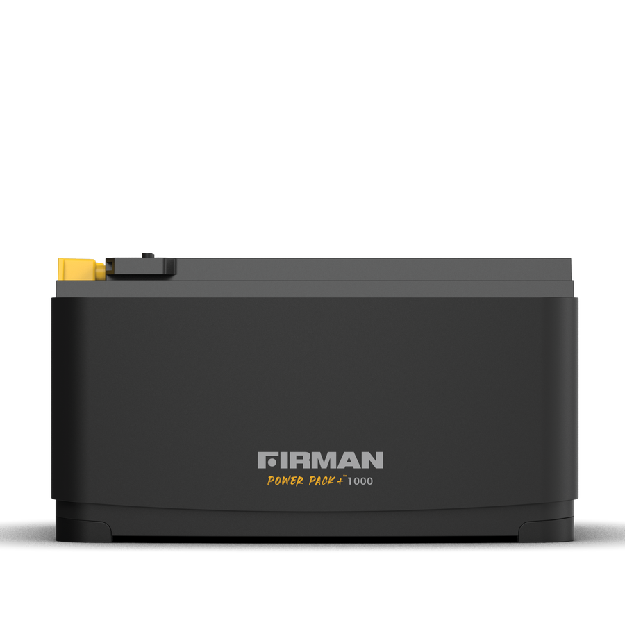 A black FIRMAN Power Pack +1000 portable battery generator on a white background.