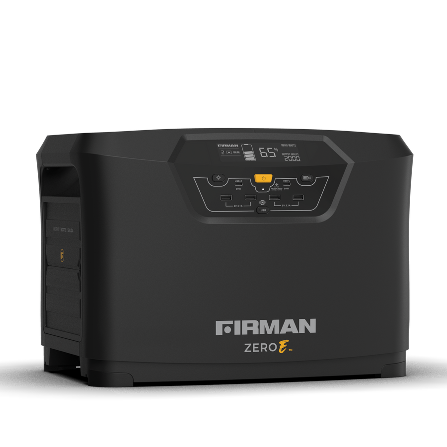 A black FIRMAN Zero E Portable Expandable Power Station with a digital display, several output ports, and a prominent logo on the front now incorporates lithium iron phosphate for enhanced durability and safety.