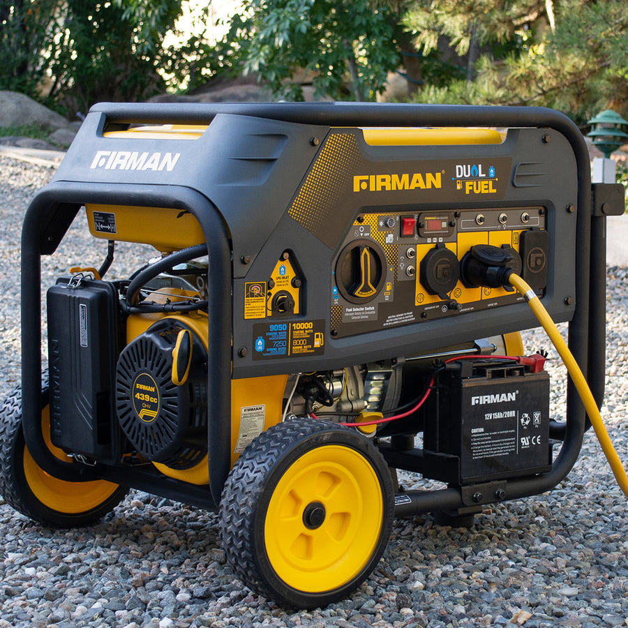 A FIRMAN Power Equipment Dual Fuel Portable Generator 8000W Electric Start 120/240V with yellow and black casing, displayed outdoors on a gravel surface.