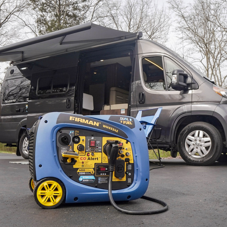 A portable blue and yellow FIRMAN Power Equipment Dual Fuel Inverter Portable Generator 4000W Electric Start with CO ALERT placed in front of an open camper van.
