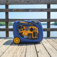 A blue and yellow FIRMAN Power Equipment Dual Fuel Inverter Portable Generator 4000W Electric Start with CO ALERT from the Whisper Hybrid Series on a wooden dock overlooking a lake.